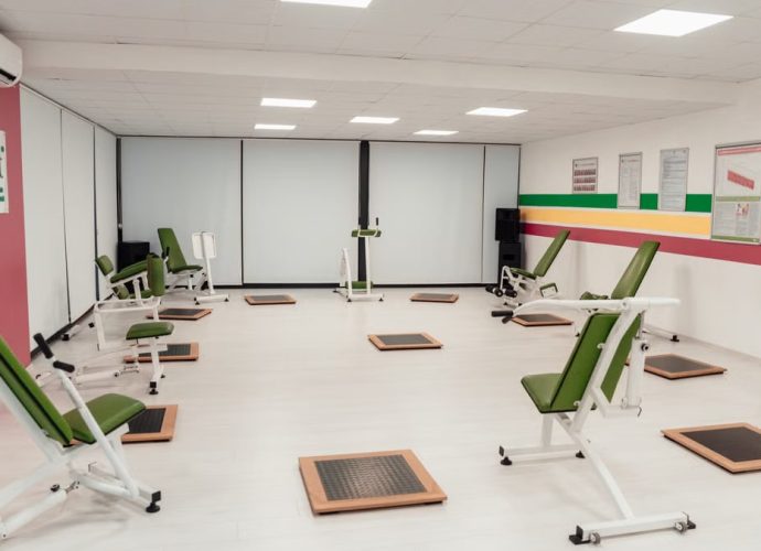 Bright and spacious gym interior featuring modern green exercise machines in Yalova.
